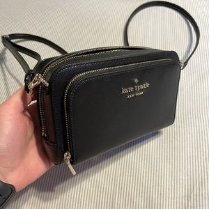 BRAND NEW Kate spade purse!! Never used! The tags are off bc It was a Xmas gift!